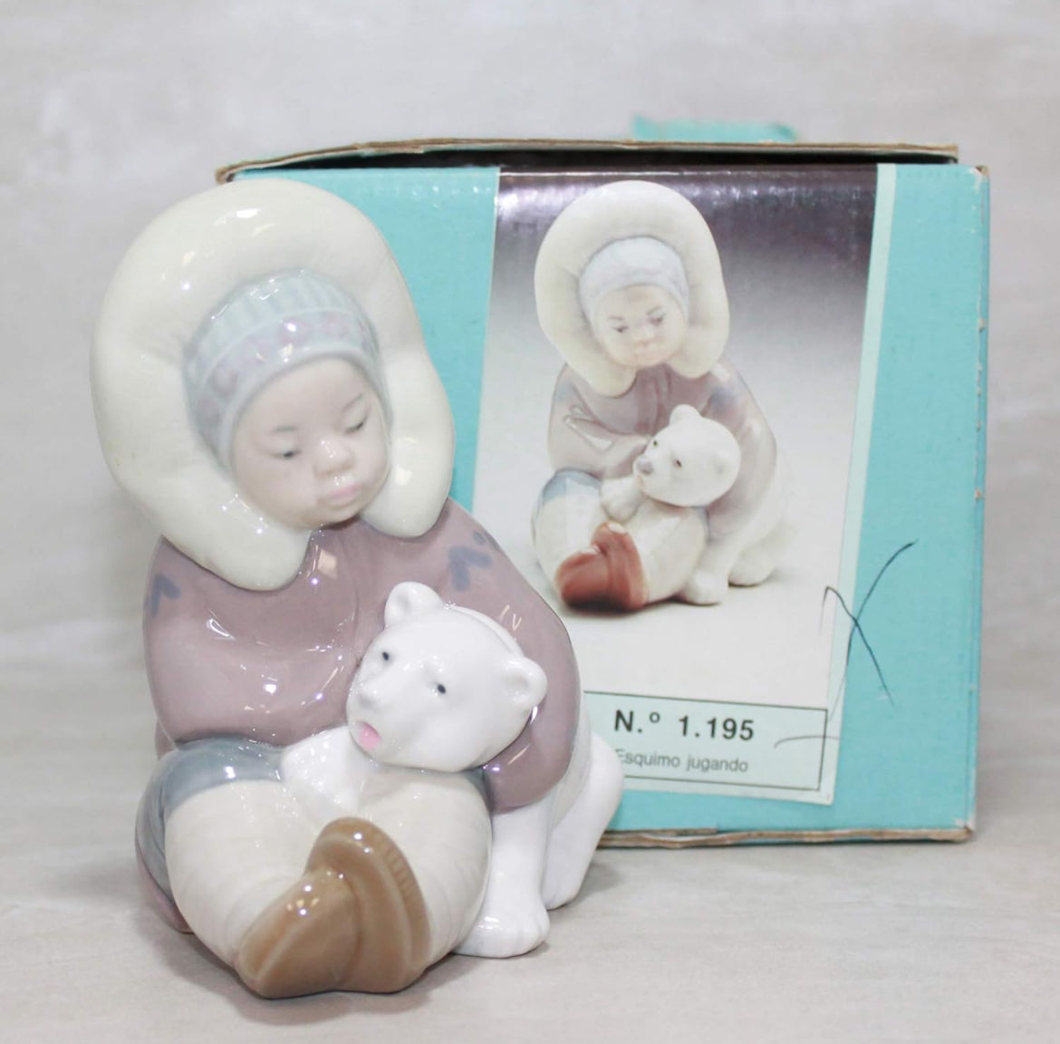 Lladro - Eskimo Playing - Porcelain Figurine